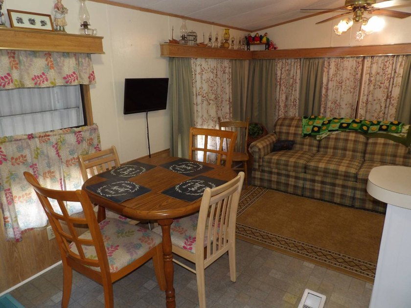 This cozy and partially furnished, 12 X 33 1 BR 1 BA home with - photo 33