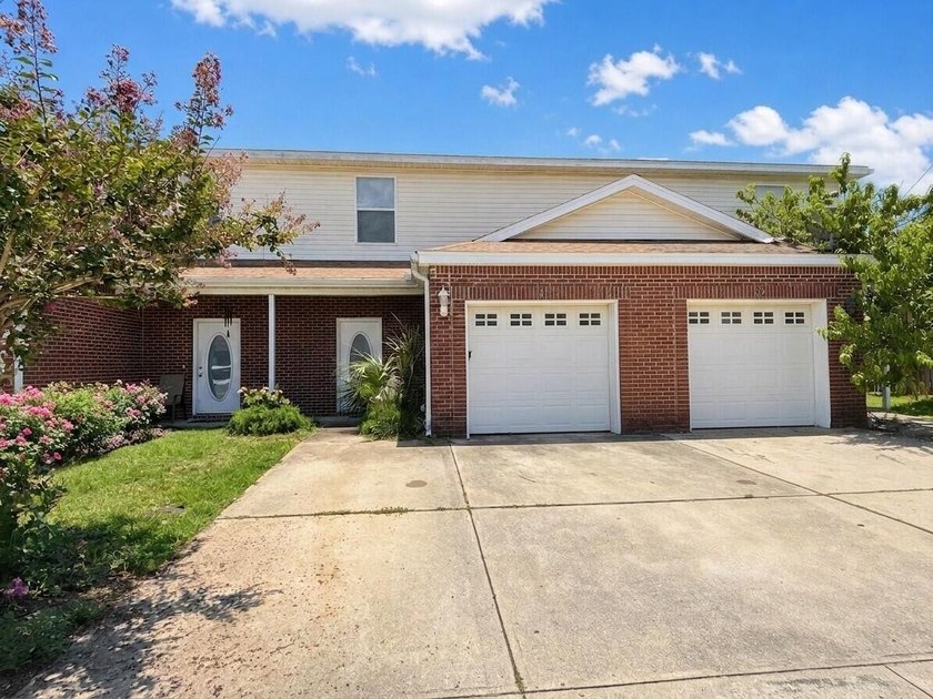Discover this spacious two-story, three-bedroom townhome in - photo 2