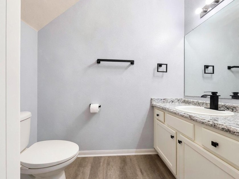 Discover this spacious two-story, three-bedroom townhome in - photo 8