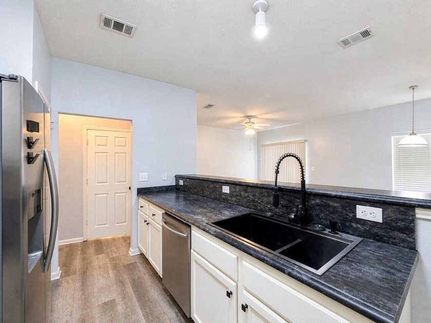 Discover this spacious two-story, three-bedroom townhome in - photo 9