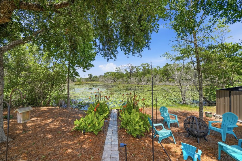 Rare opportunity to purchase this pool home with water views! - photo 5