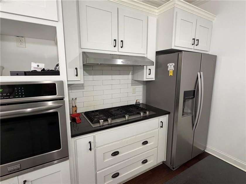 Buford City Schools! Don't miss this beautifully maintained - photo 8