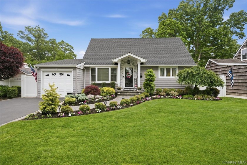 Welcome to this MINT Cape Cod-style home nestled in the heart of - photo 2