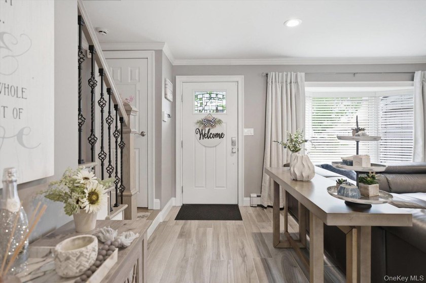Welcome to this MINT Cape Cod-style home nestled in the heart of - photo 3