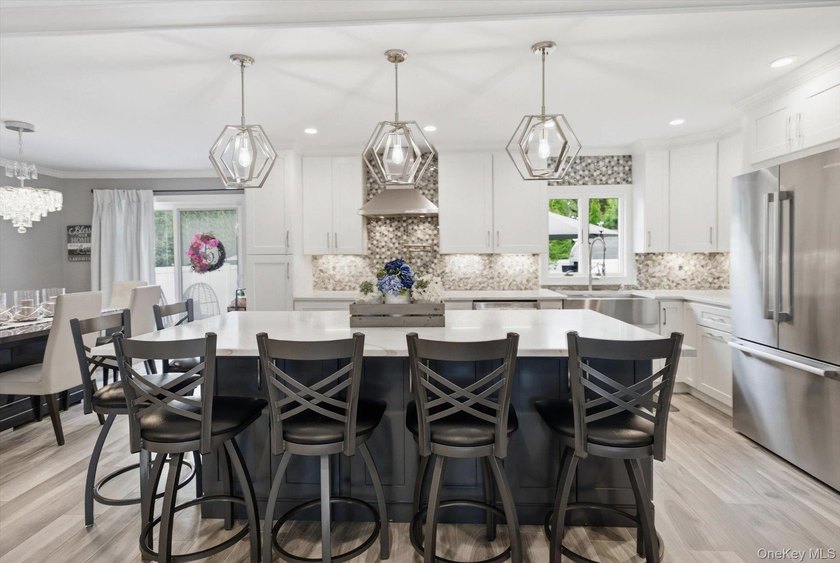 Welcome to this MINT Cape Cod-style home nestled in the heart of - photo 9