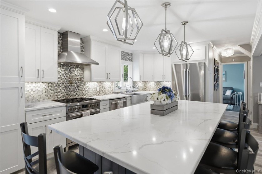 Welcome to this MINT Cape Cod-style home nestled in the heart of - photo 10