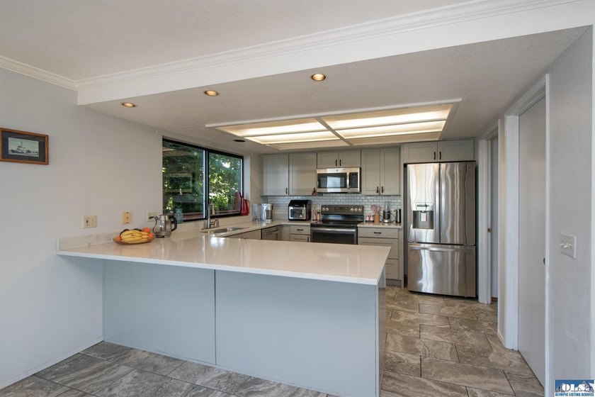 Perched on a high-bank overlooking the waterfront, this property - photo 14