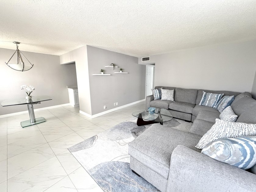 Tastefully updated condo located in a desirable 55+ gated - photo 10