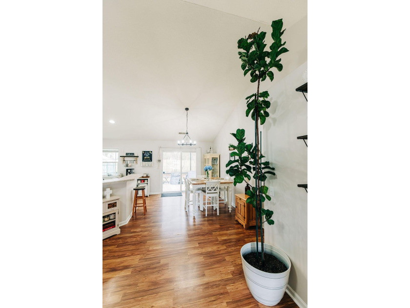 Welcome to this charming 3-bedroom, 2-bathroom home featuring a - photo 7