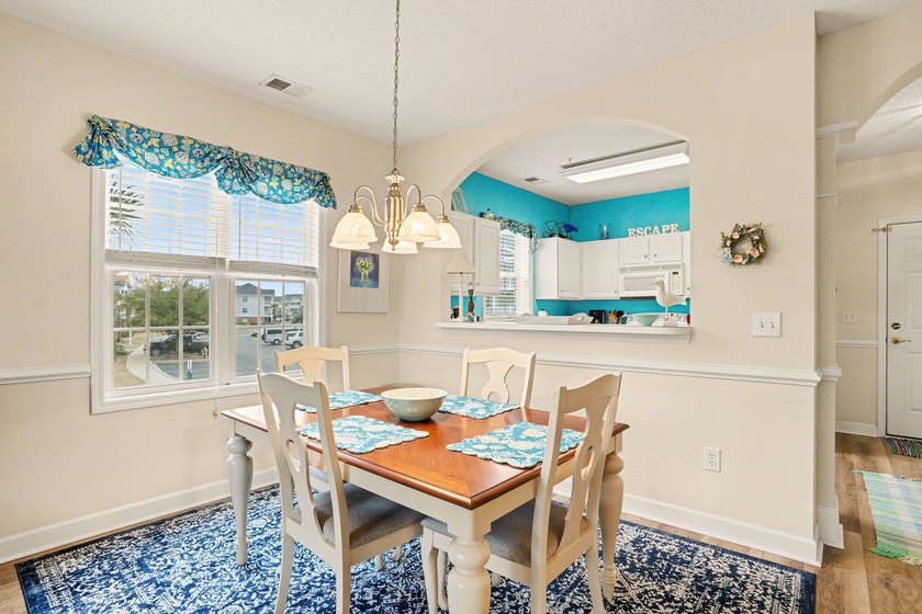 Welcome to this bright and beachy 2-bedroom, 2-bath end-unit - photo 6