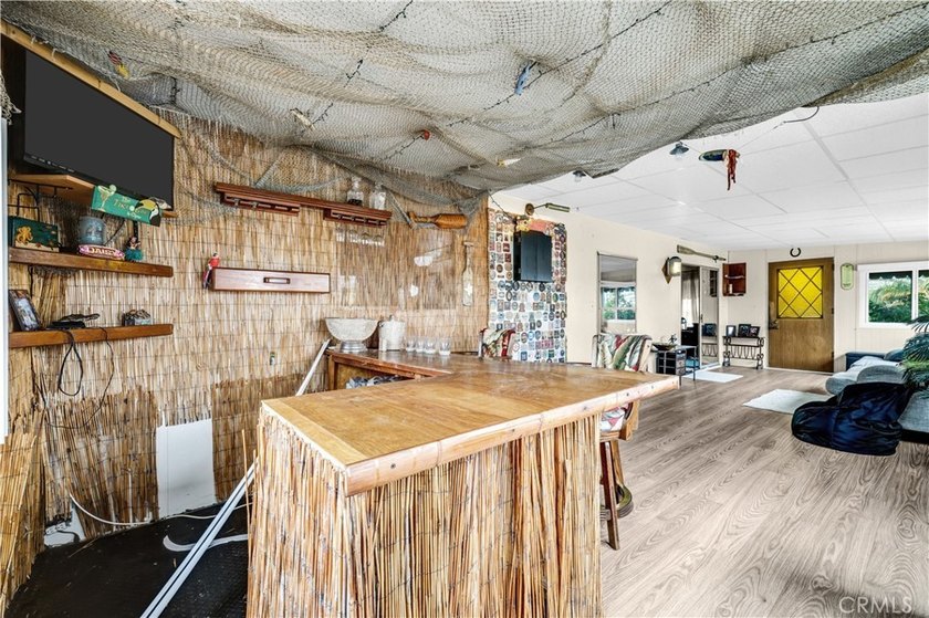 * *MOVE IN READY CORNER LOT WITH TIKI ROOM AND LARGE YARD.* - photo 13