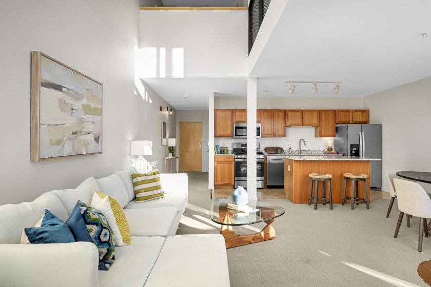 This stylish two story loft offers modern living with all the - photo 5