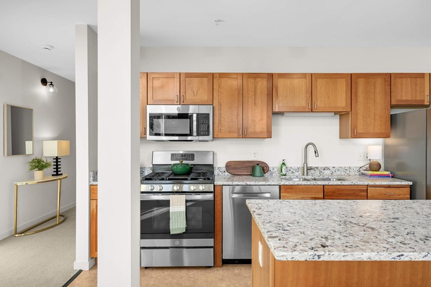 This stylish two story loft offers modern living with all the - photo 9