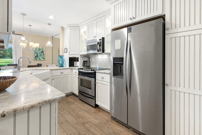 This highly sought-after condominium offers the perfect blend of - photo 6