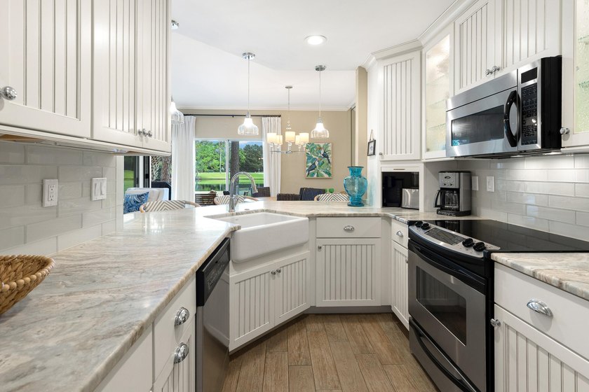 This highly sought-after condominium offers the perfect blend of - photo 7