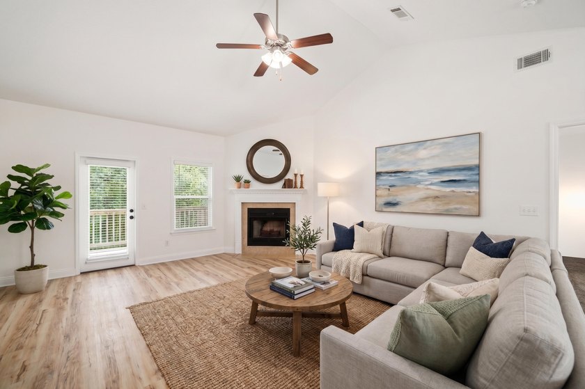Set on a huge 0.52 acre lot with peaceful forest views, this - photo 7
