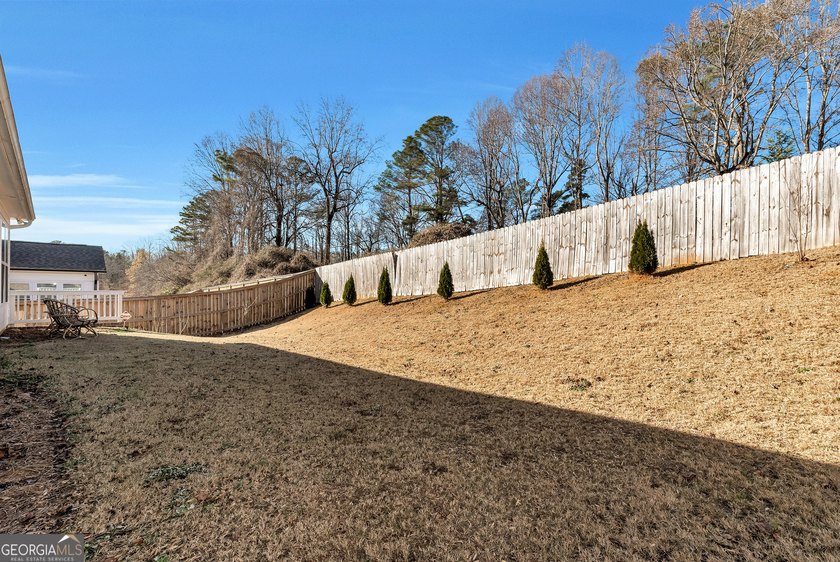 Welcome home to this stunning 5-bedroom, 3-bath home in the - photo 40