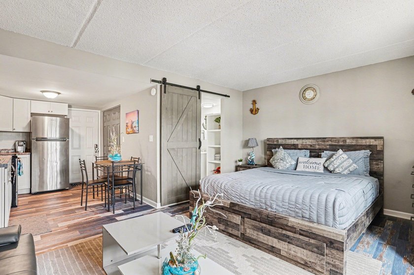 Fully remodeled unit with a lovely pond view in the heart of the - photo 9