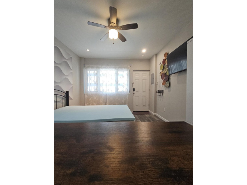 This charming studio condo offers an ideal blend of - photo 3