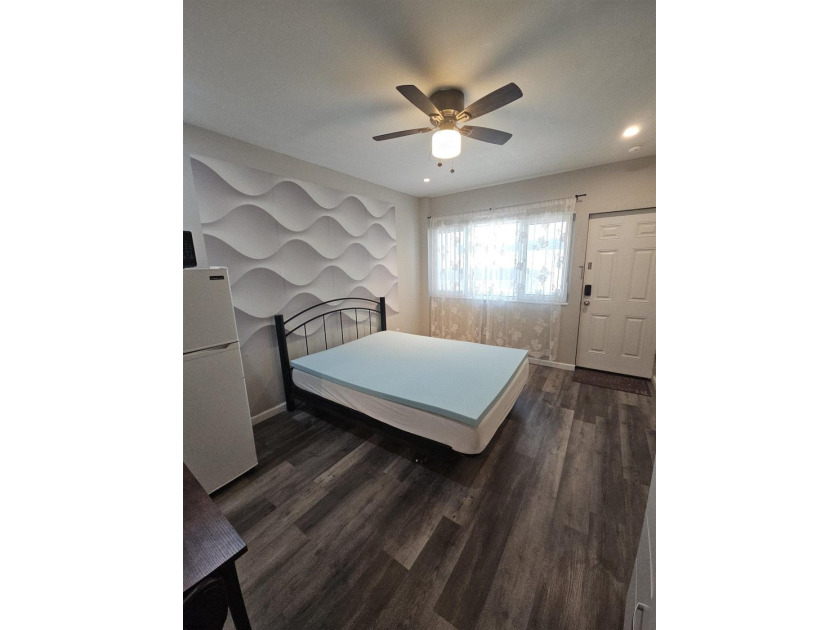 This charming studio condo offers an ideal blend of - photo 9