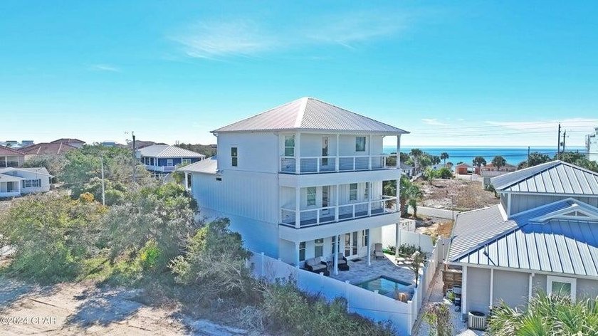 Experience refined coastal living just moments from the - photo 5