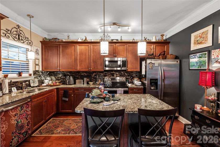 Welcome home to this beautifully maintained townhome in the - photo 16
