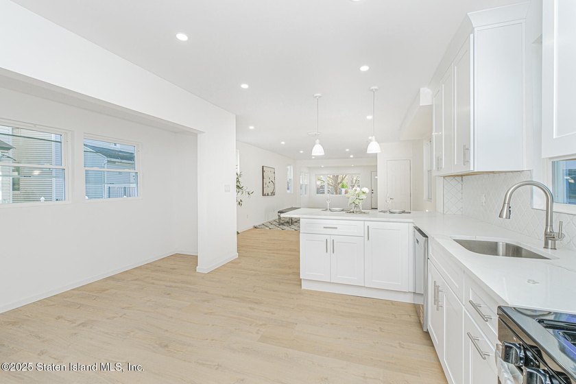 Discover your dream home at 11 Laforge Ave! This renovated - photo 3