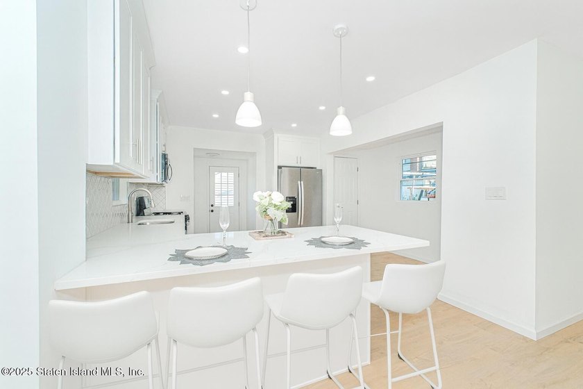 Discover your dream home at 11 Laforge Ave! This renovated - photo 4