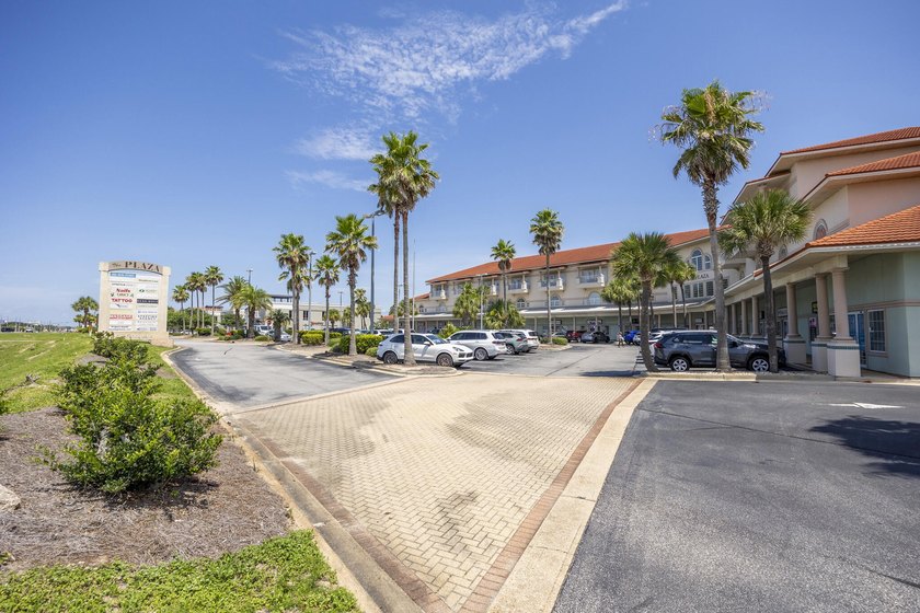 Welcome to The Plaza, a boutique 12-unit condominium located in - photo 3
