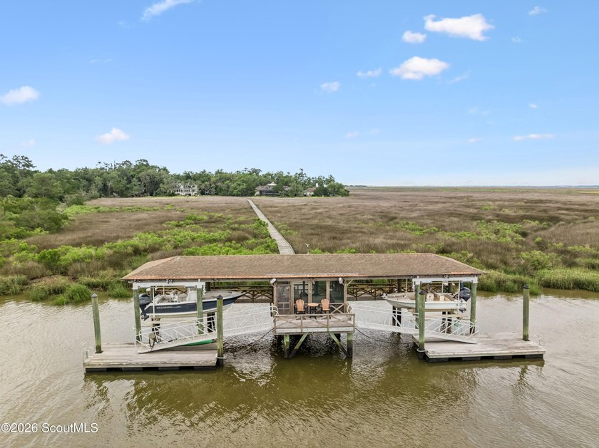 Experience exceptional deep-water waterfront living on the - photo 13