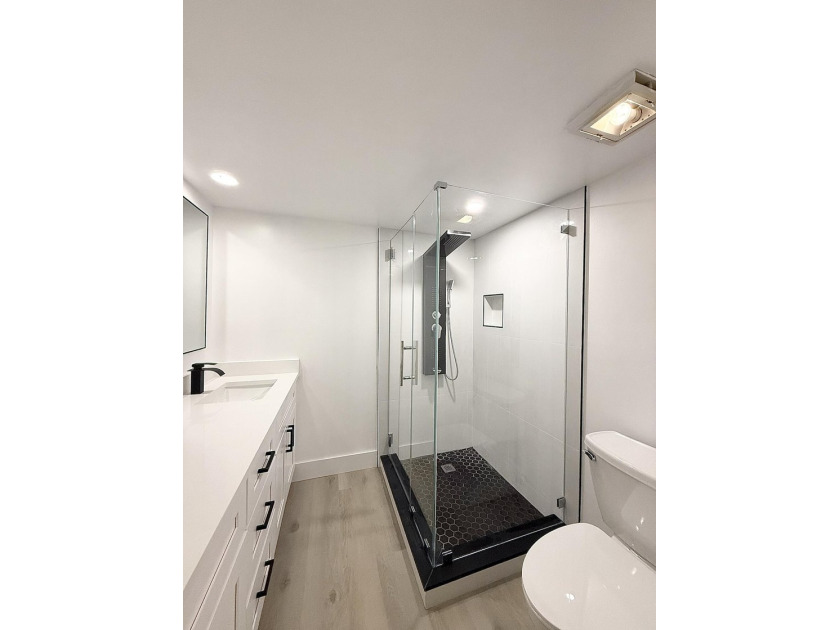 Beautifully renovated townhome, updated top to bottom, with - photo 7