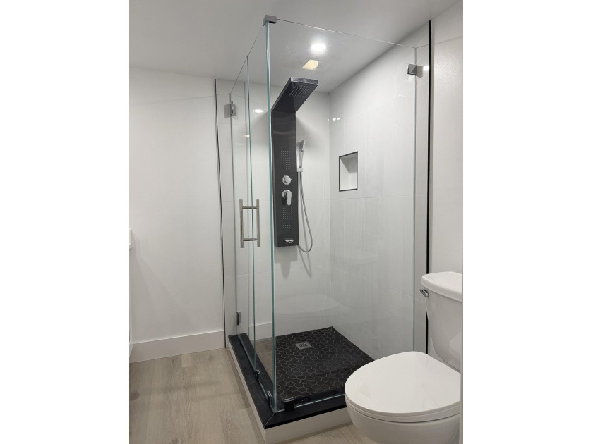 Beautifully renovated townhome, updated top to bottom, with - photo 8