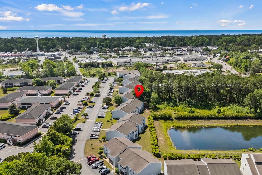 Welcome to this charming 2-bedroom, 2-bathroom condo located - photo 2