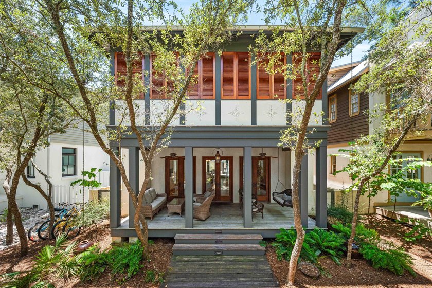 This timeless, Rosemary Beach home offers an inviting covered - photo 2