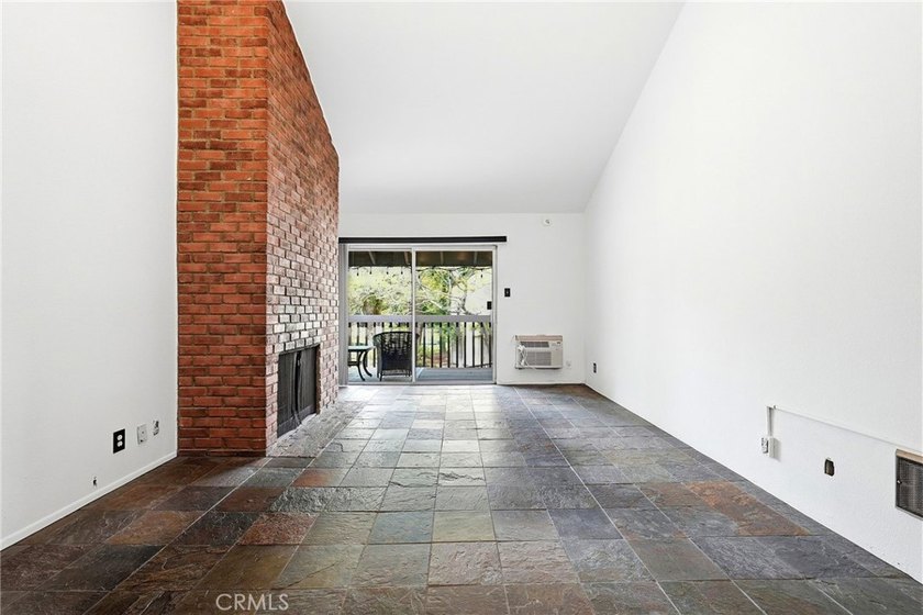 Welcome to this upper-level 2-bedroom, 2-bath condo offering 1 - photo 3