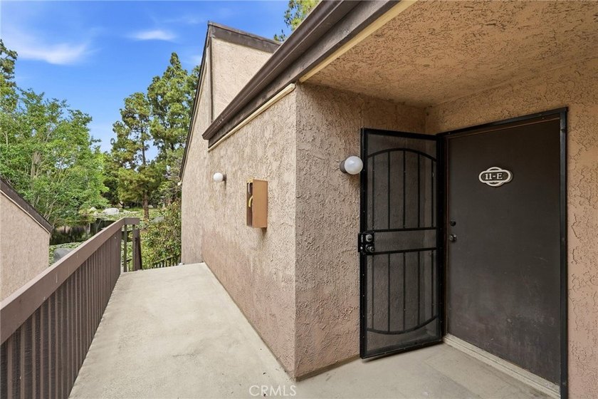 Welcome to this upper-level 2-bedroom, 2-bath condo offering 1 - photo 8