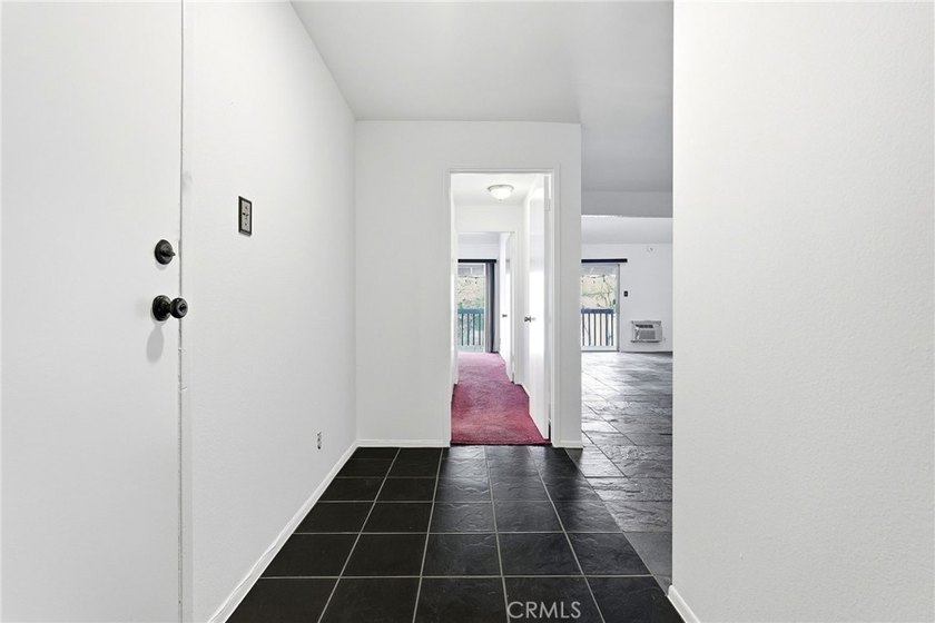 Welcome to this upper-level 2-bedroom, 2-bath condo offering 1 - photo 9