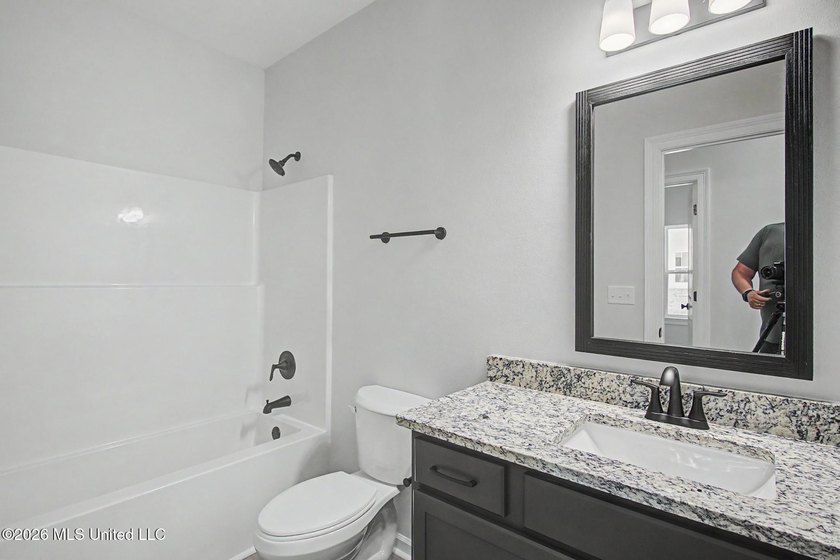 You'll feel right at home in this beautiful new construction - photo 14