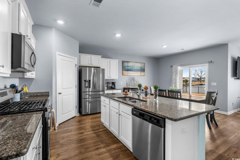 Single-level living in Village Oaks in Carolina Forest with the - photo 11
