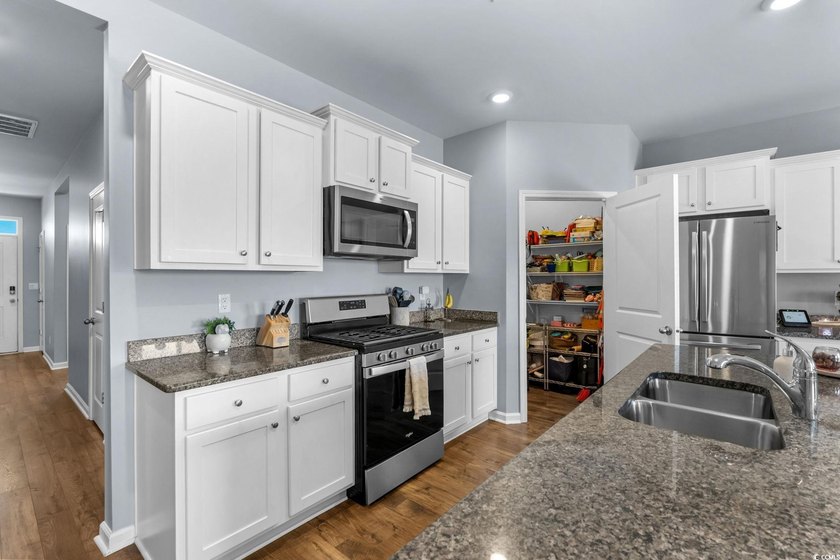 Single-level living in Village Oaks in Carolina Forest with the - photo 12