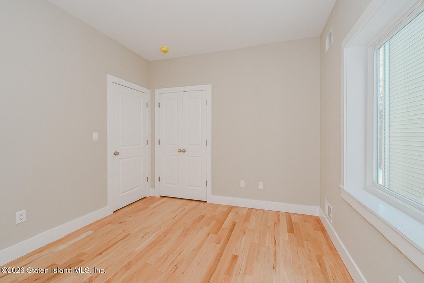 NEW CONSTRUCTION! Beautiful oversized TWO family 6/6 built with - photo 14