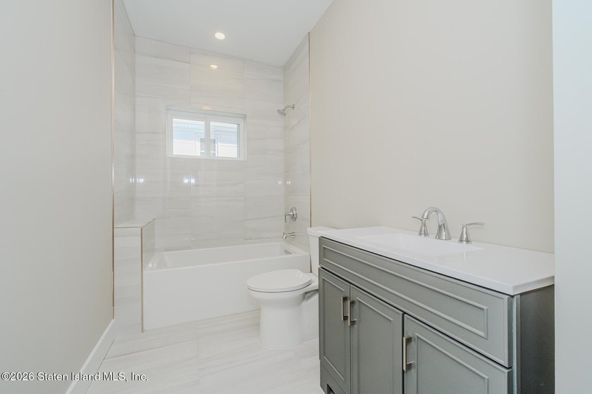 NEW CONSTRUCTION! Beautiful oversized TWO family 6/6 built with - photo 15