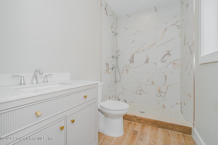 NEW CONSTRUCTION! Beautiful oversized TWO family 6/6 built with - photo 18
