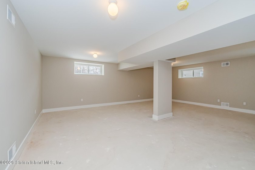 NEW CONSTRUCTION! Beautiful oversized TWO family 6/6 built with - photo 24