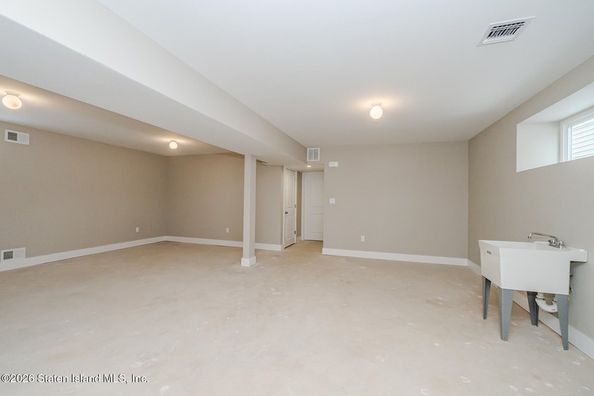 NEW CONSTRUCTION! Beautiful oversized TWO family 6/6 built with - photo 30