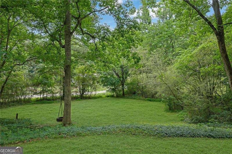 Nestled on a private lot in the quiet Lake Allatoona community - photo 48