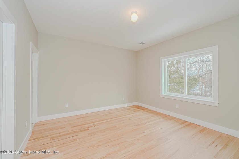 NEW CONSTRUCTION! Beautiful oversized TWO family 6/6 built with - photo 49