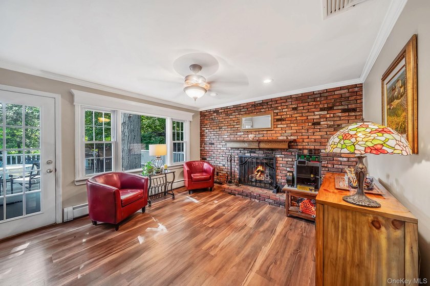Nestled on a beautifully landscaped property surrounded by - photo 6