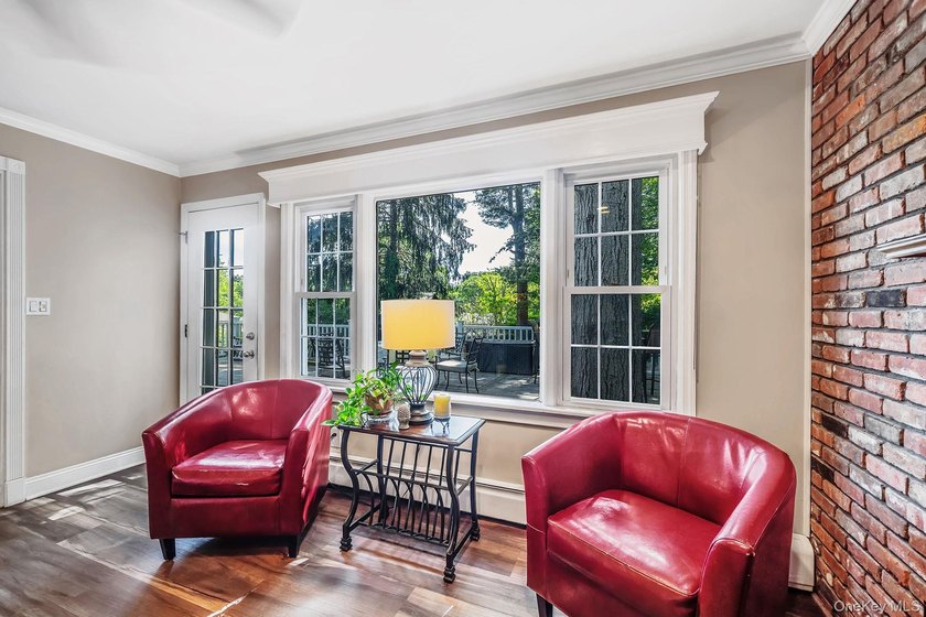Nestled on a beautifully landscaped property surrounded by - photo 8