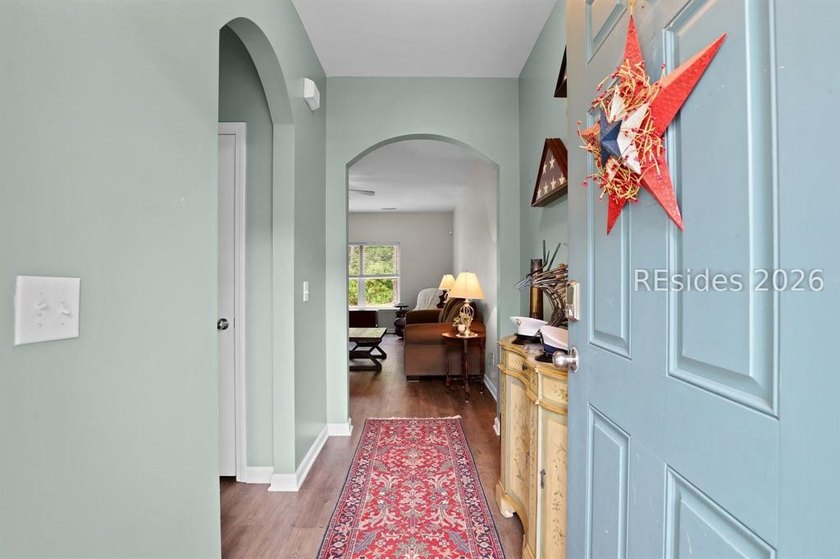 Offered at $400,000, this beautifully maintained 4-bedroom, 2 - photo 4